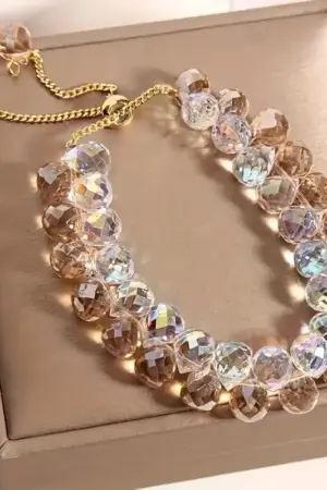 Pulcera Cristal artificial blanca tornasol caramelo