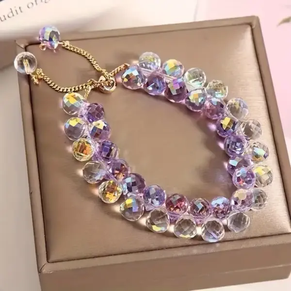 Pulcera Cristal artificial blanca tornasol y lila