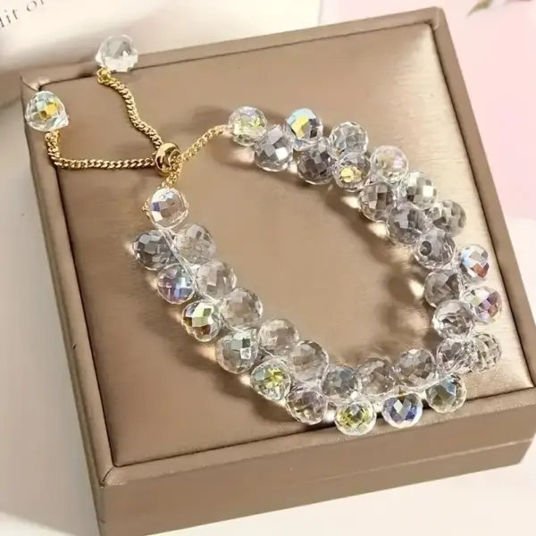 Pulcera Cristal artificial blanca tornasol