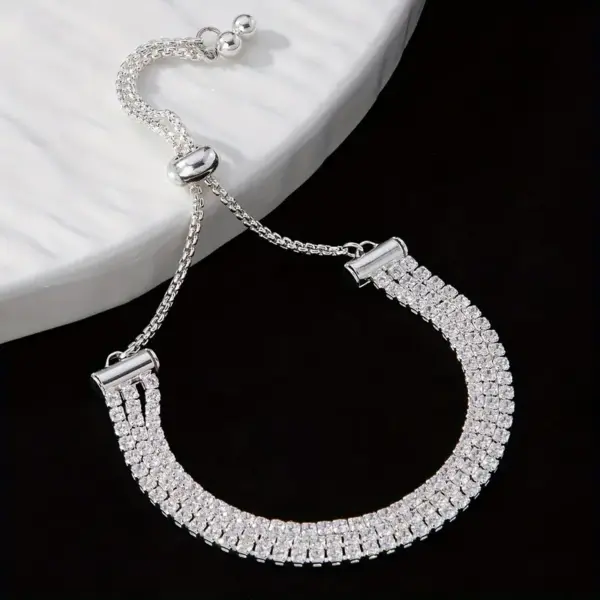 Pulcera strass tres lineas ajustable - Imagen 5