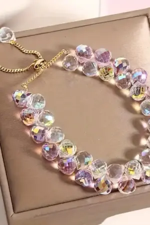 Pulcera Cristal artificial blanca tornasol y rosa