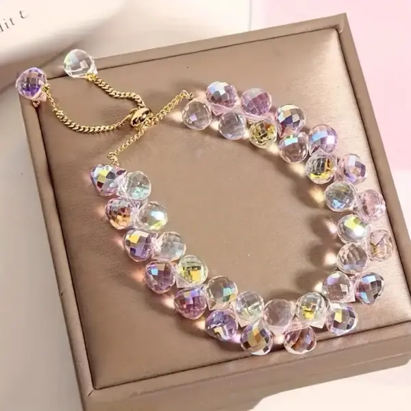 Pulcera Cristal artificial blanca tornasol y rosa